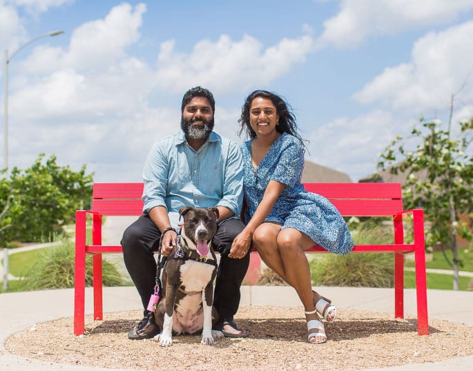 Dog With Happy Couple